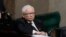 FILE - Jaroslaw Kaczynski, the leader of Poland's ruling party, listens during a parliament vote in Warsaw on Aug. 17, 2023. The Law and Justice party is seeking an unprecedented third term in the October 15 election.