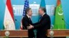United States Secretary of State Antony Blinken, left, and Kazakhstan's Foreign Minister Mukhtar Tileuberdi greet each other at the end of a joint press conference at the Ministry of Foreign Affairs, in Astana, Kazakhstan, Feb. 28, 2023. 