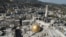 FILE - The remains of a mosque in the aftermath of a deadly earthquake in Idlib province, Syria, Feb. 24, 2023. Sources say Iran has used earthquake relief flights to bring weapons and military equipment into its strategic ally Syria.