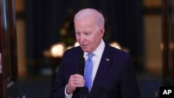 President Joe Biden speaks before a dinner for Combatant Commanders in the Cross Hall of the White House in Washington, May 3, 2023.