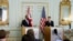 British Foreign Secretary James Cleverly, left, holds a joint news conference with U.S. Secretary of State Antony Blinken in London, June 20, 2023.
