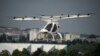 Volocopter 2X, lepas landas dan mendarat vertikal elektrik, melakukan demonstrasi penerbangan pada Paris Air Show di Le Bourget, utara Paris, Prancis, Senin, 19 Juni 2023. (AP/Lewis Joly)