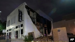 A damaged building is shown in the aftermath of a severe thunderstorm that passed through downtown, May 16, 2024, in Houston.