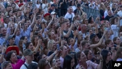 People enjoy a concert at the Atlas Festival in Kyiv, Ukraine, July 21, 2024.