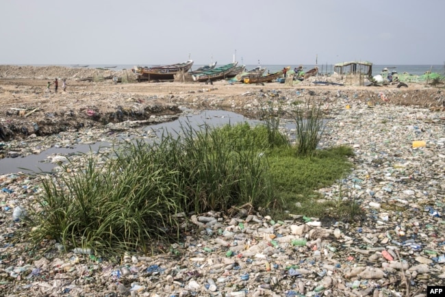 FILE - Plastic waste litters the coastline in Bargny, Senegal, Sept. 17, 2022.