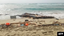FILE - This photo obtained from Italian news agency Ansa, taken on February 26, 2023 shows debris of a shipwreck washed ashore in Steccato di Cutro, south of Crotone, after a migrants' boat sank off Italy's southern Calabria region.
