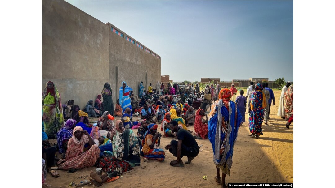 FILE - In this handout photo, Sudanese refugees gather as Doctors Without Borders teams assist the war-wounded from West Darfur, Sudan, in Adre hospital, Chad, June 16, 2023. (Mohammad Ghannam/MSF/Handout via Reuters)