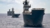 Kapal-kapal Angkatan Laut Australia berlayar dalam formasi bersama 37 kapal lainnya selama latihan Rim of the Pacific (RIMPAC) pada tahun 2022. RIMPAC 2024 sedang berlangsung sekarang, dengan 29 negara berpartisipasi. (foto: Australian Defense Force)
