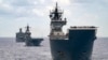 资料照片:澳大利亚国防军照片显示澳大利亚皇家海军的军舰与其他37个国家的军舰编队参加2022年的“环太军演”。