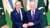 FILE - Pakistani Prime Minister Shehbaz Sharif, left, meets with Uzbek President Shavkat Mirziyoyev on the sidelines of the Shanghai Cooperation Organization summit in Astana, Kazakhstan, July 3, 2024.