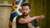 Ukrainian President Volodymyr Zelenskyy gestures during a press conference in Kyiv, July 15, 2024. 