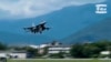 FILE - An F-16 takes off from Hualien Airbase in Taiwan's southeastern Hualien county, Aug. 20, 2023, in this grab from video released by the Taiwan Military News Agency. . 