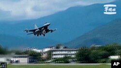 An F-16 takes off from Hualien Airbase in Taiwan's southeastern Hualien county, Aug. 20, 2023, in this grab from video released by the Taiwan Military News Agency. Taiwan deployed aircraft and vessels and activated land-based missile systems after the Chinese military launched drills around Taiwan.