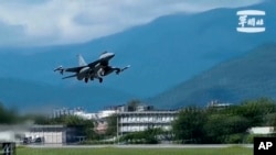 An F-16 takes off from Hualien Airbase in Taiwan's southeastern Hualien county, Aug. 20, 2023, in this grab from video released by the Taiwan Military News Agency. Taiwan deployed aircraft and vessels and activated land-based missile systems after the Chinese military launched drills around Taiwan.