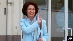 Gordana Siljanovska-Davkova leaves a polling station in Skopje, North Macedonia, May 8, 2024. She was declared North Macedonia's first woman president after receiving nearly 65% support with more than two-thirds of the vote counted in a presidential runoff.