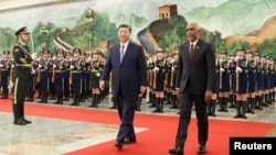 FILE PHOTO: Chinese President Xi Jinping and Maldivian President Mohamed Muizzu attend a welcome ceremony at the Great Hall of the People in Beijing, Jan. 10, 2024. (cnsphoto via Reuters)