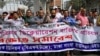 Journalists of the Dainik Dinkal publication hold a rally to protest against the government's order to halt its production in Dhaka, Bangladesh, on Feb. 20, 2023.