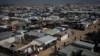 FILE - A view of the makeshift tent camp where Palestinians displaced by the Israeli bombardment of the Gaza Strip are staying, in the Muwasi area, southern Gaza, Jan. 1, 2024. 