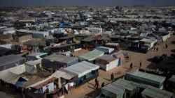 FILE - A view of the makeshift tent camp where Palestinians displaced by the Israeli bombardment of the Gaza Strip are staying, in the Muwasi area, southern Gaza, Jan. 1, 2024. 