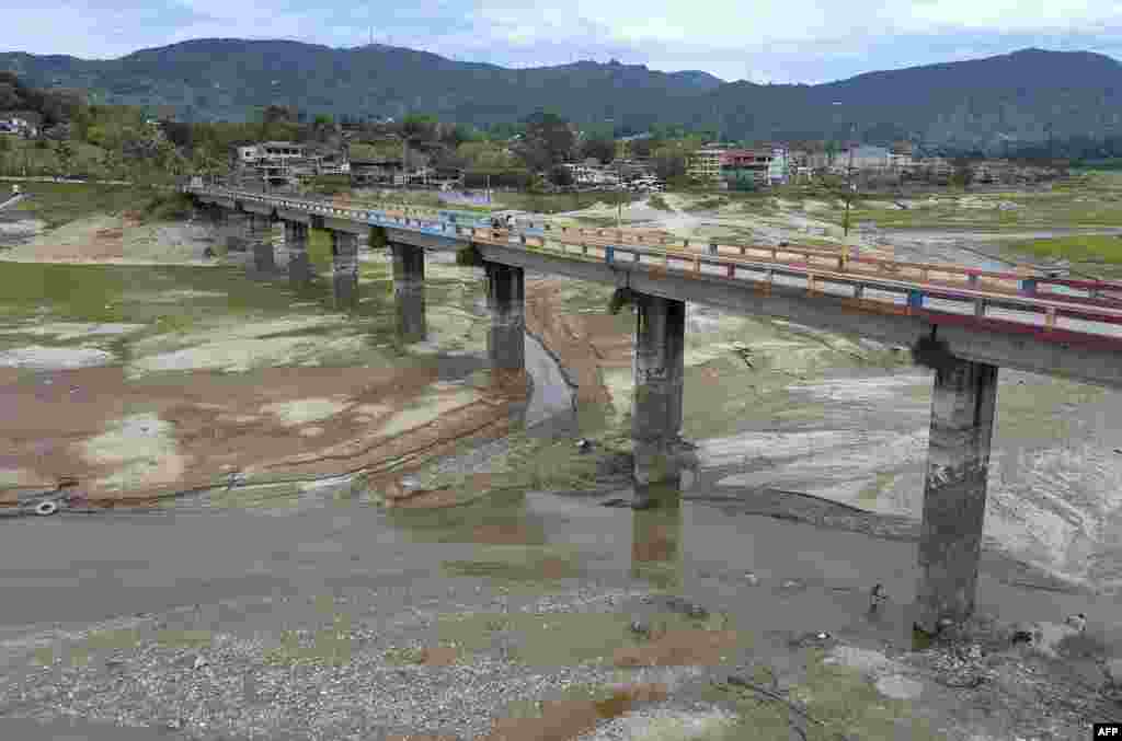 Aerial view of a bridge in the El Peñol-Guatape Reservoir in Guatape, department of Antioquia, 62 km east of Medellin, Colombia, March 12, 2024. 