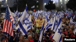 Protesters demand Israeli Prime Minister Benjamin Netanyahu's ouster, in the wake of the deadly October 7 attack on Israel by the Palestinian Islamist group Hamas and the ensuing war in Gaza, at a demonstration in Jerusalem, April 1, 2024. 