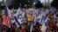 Protesters demand Israeli Prime Minister Benjamin Netanyahu's ouster, in the wake of the deadly October 7 attack on Israel by the Palestinian Islamist group Hamas and the ensuing war in Gaza, at a demonstration in Jerusalem, April 1, 2024. 