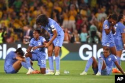 France players react with disappointment at the end of their Women's World Cup quarterfinal soccer match against Australia in Brisbane, Australia, on Aug. 12, 2023.