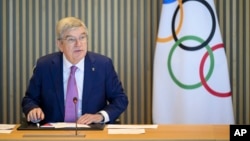 International Olympic Committee President Thomas Bach speaks at the Olympic House in Lausanne, Switzerland, March 19, 2024. Moscow's criticism of Olympic restrictions on Russian athletes "goes beyond anything that is acceptable" committee spokesman Mark Adams said on Wednesday. 