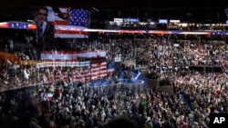 FILE - Participants stand for the signing of the national anthem before the start of the second day session of the Democratic National Convention in Philadelphia, July 26, 2016.