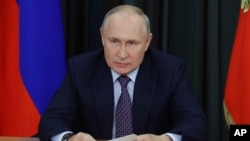 Ruski predsjednik Vladimir Putin na sastanku u Moskvi (Foto: Mikhail Klimentyev, Sputnik, Kremlin Pool via AP)