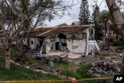 ARHIVA - Oštećena kuća u Beriju (Foto: AP/Tsafrir Abayov)