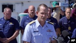 U.S. Coast Guard Rear Adm. John Mauger, commander of the First Coast Guard District, talks to reporters June 22, 2023, at Coast Guard Base Boston about the implosion of the missing submersible Titan near the wreckage of the Titanic.