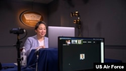 FILE - Deputy Assistant Secretary of Defense for Cyber Policy Mieke Eoyang speaks during Cybercon, virtually, at the Pentagon, Washington, D.C., Nov. 10, 2021. Eoyang says the U.S. needs to disrupt malicious cyber activity.