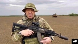 Yevgeny Prigozhin, the owner of the Wagner Group military company, speaks to a camera at an unknown location, in this image taken from video released by Razgruzka_Vagnera Telegram channel on Aug. 21, 2023