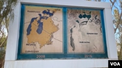 A board in Muynak, a former port on the Aral Sea, Karakalpakstan, Uzbekistan, Sept. 12, 2022, shows how the sea shrank from 2008 to 2016.