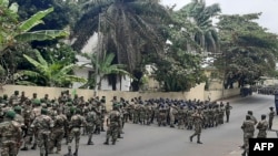 Gabonese soldiers gather ahead of a possible address by General Brice Oligui Nguema in Libreville on Sept. 2, 2023.