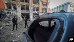 The city center is covered with debris after the Russian missile attack in Kharkiv, Ukraine, May, 25, 2024. 