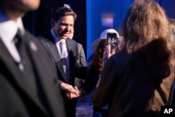 Presidential candidate and Florida Gov. Ron DeSantis greets supporters after speaking at The Gathering in Atlanta, on Aug. 18, 2023.