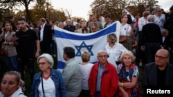 Supporters of Israel hold a solidarity rally in Paris, France, Oct. 9, 2023.