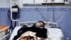 FILE - A young woman lies in hospital after reports of poisoning at an unspecified location in Iran in this still image from video from March 2, 2023. (WANA/Reuters TV via Reuters)