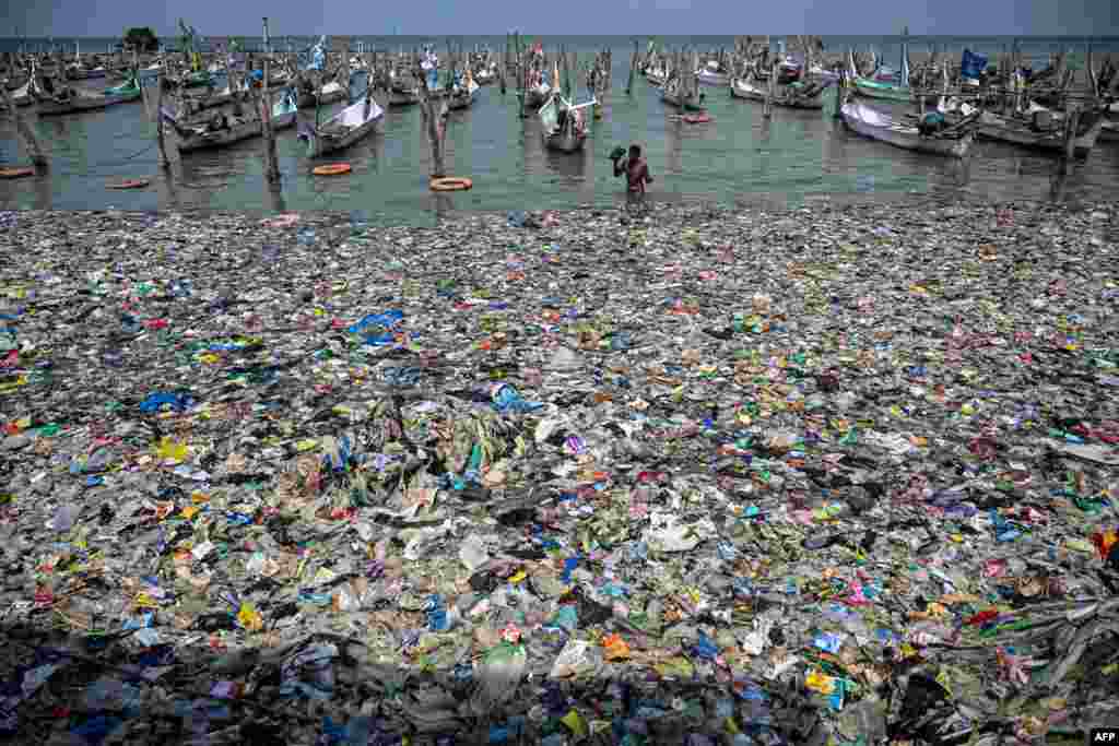 A polluted shore is seen on the beach in Bangkalan, Madura Island, East Java province.