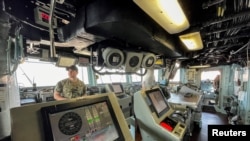 FILE - General view inside the USS America (LHA-6) amphibious assault ship docked at a port in Manila, Philippines, March 21, 2023. 