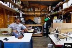 Sonwabile Ndamase in his workshop in Johannesburg. Ndamase designed for Nelson Mandela and other iconic leaders like President Bill Clinton and celebrities like Mike Tyson. (Zaheer Cassim/VOA)