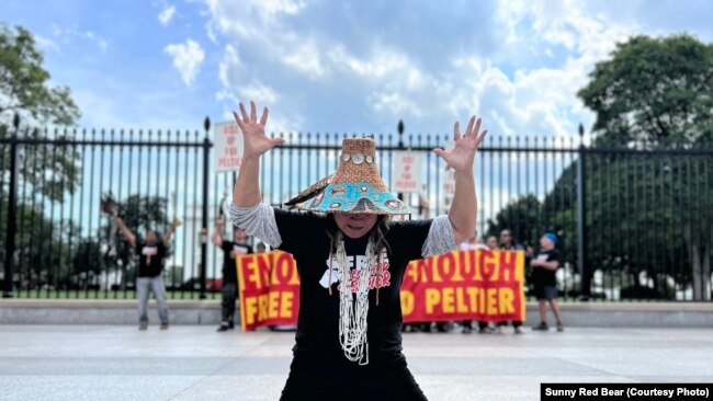 National Congress of American Indians president Fawn Sharp prays during protests outside of the White House in support of Leonard Peltier Tuesday, Sept. 12, 2023.