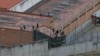 Prisoners Release Police, Guards Taken Hostage in Ecuador Prisons 