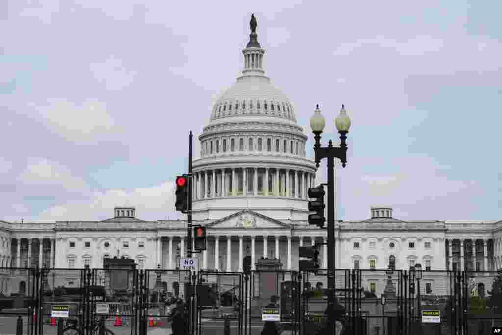 The U.S. Capitol is seen behind a security fence ahead of Israeli Prime Minister Benjamin Netanyahu's speech to a joint meeting of Congress to seek support for Israel's fight against Hamas and other adversaries, July 24, 2024, in Washington. 