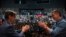 Spanish Prime Minister Pedro Sánchez applauds the socialist candidate Salvador Illa, left, during a campaign rally in Villanova i la Gertru, near Barcelona, Spain, May 9, 2024. 