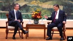 FILE - California Governor Gavin Newsom meets with Chinese President Xi Jinping at the Great Hall of the People in Beijing on Oct. 25, 2023.