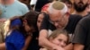 Family members mourn during the funeral of Israeli soldier Shilo Rauchberger at the Mount Herzl cemetery in Jerusalem, Oct. 12, 2023. 