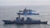 Kapal perusak dari Korea Selatan, bawah, AS, tengah, dan Jepang berlayar di tengahlatihan pertahanan rudal bersama di perairan internasional di lepas pantai timur semenanjung Korea, 17 April 2023. (Foto: via AP)